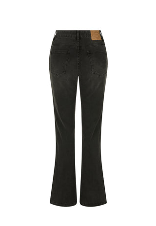 Black flared jeans shown from the back, featuring a brown leather patch on the upper right side, set against a plain white background.