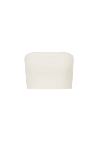 A minimalist, strapless off-white tube top with a soft, rounded rectangular silhouette, shown against a solid white background.