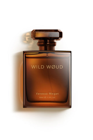Front-view image of the Wild Woud Natural Perfume. The perfume comes in a brown glass rectangular 50ml bottle.